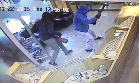 CCTV images capture raid on jewellers by armed gang